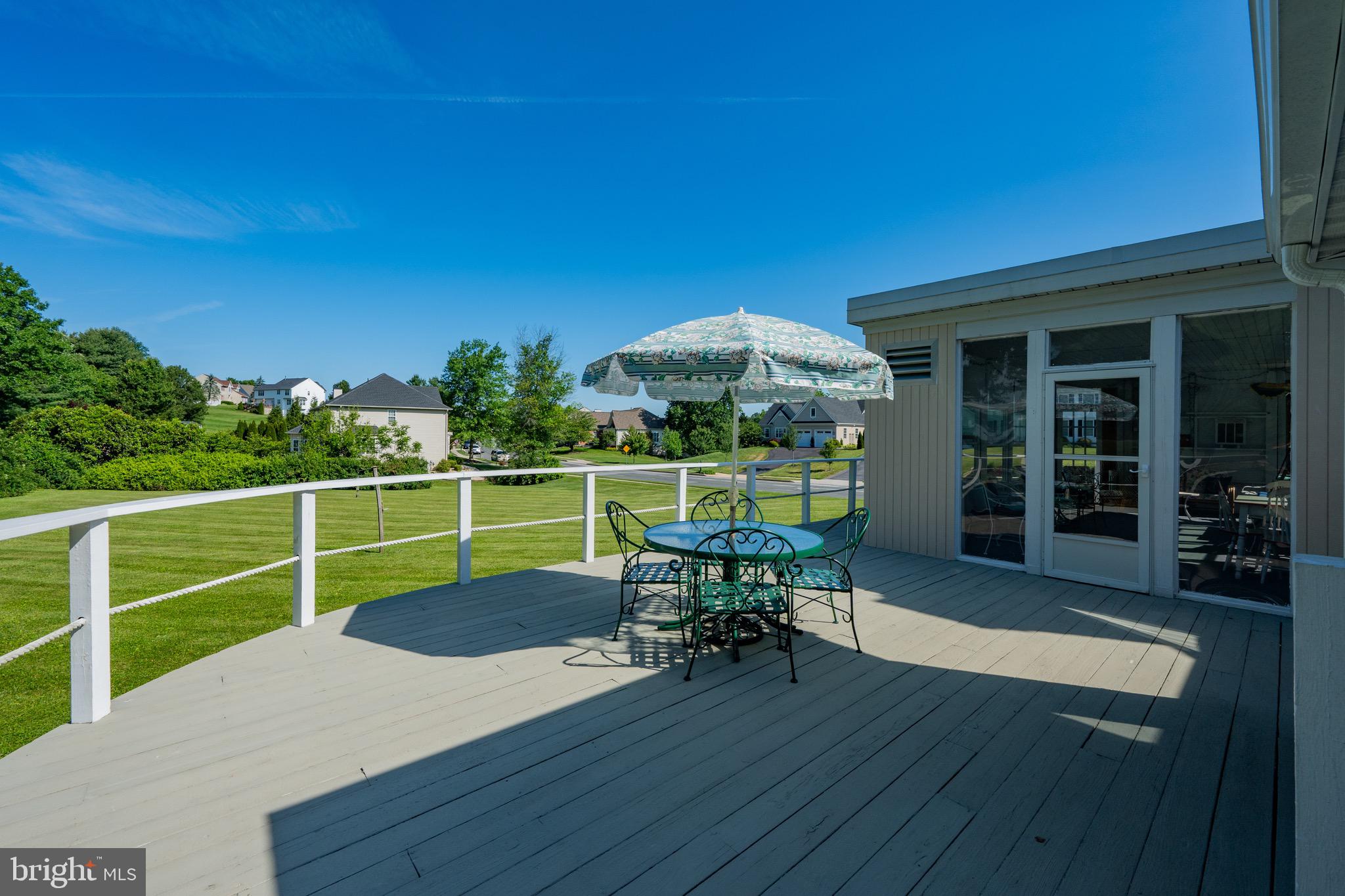 1030 Gist Road Westminster, MD 21157 - Photo 7 of 43 Lots of deck space leading into sunroom