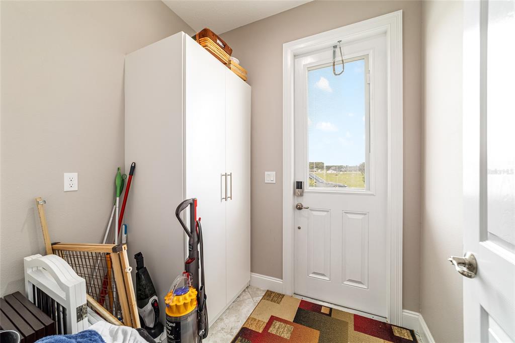 1983 Northwest 79th Loop Ocala, FL 34475 - Photo 56 of 97 a view of an entryway with wooden floor