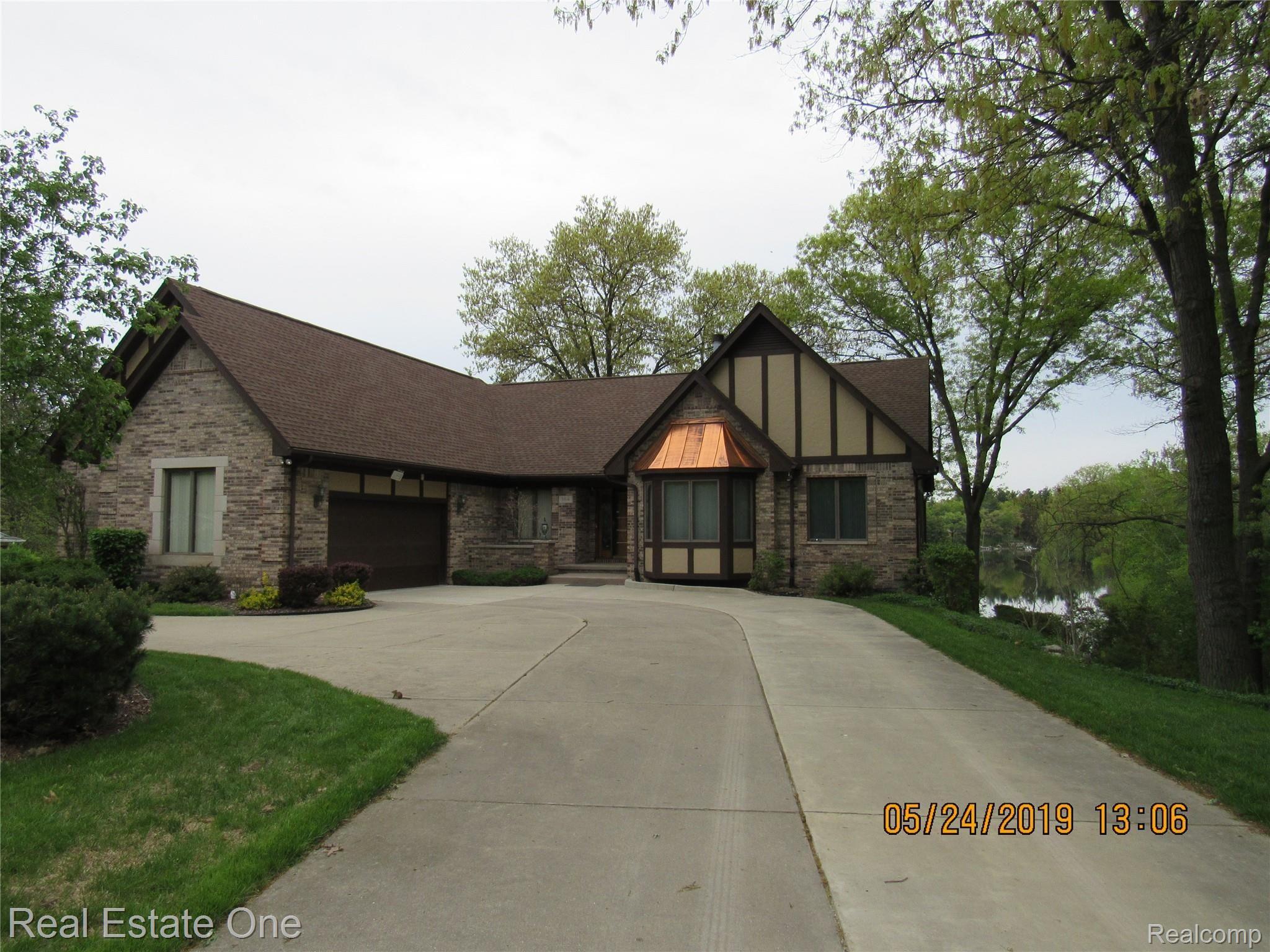 384 Nakomis Road Lake Orion, MI 48362 - Photo 1 of 77 Mr. Maintain & Mrs. Clean's Brick Lakefront Ranch!