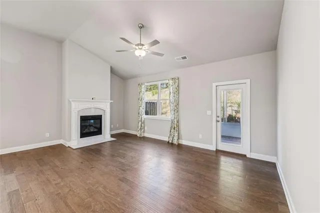 a kitchen with granite countertop stainless steel appliances and stove