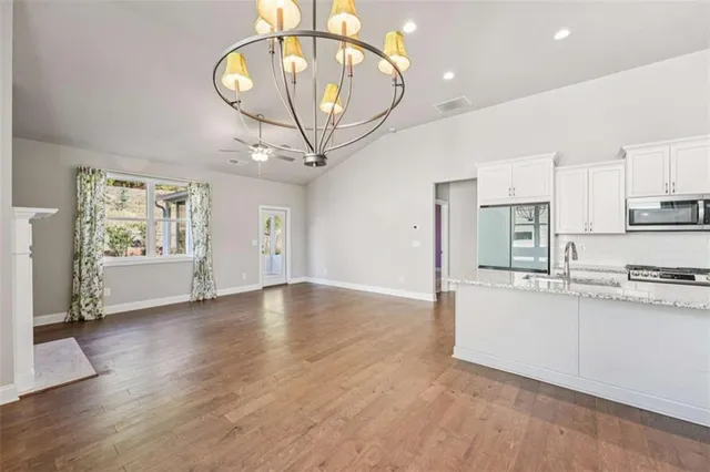 a spacious bathroom with a double vanity sink mirror and double