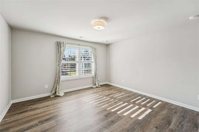 a view of a house with a garden