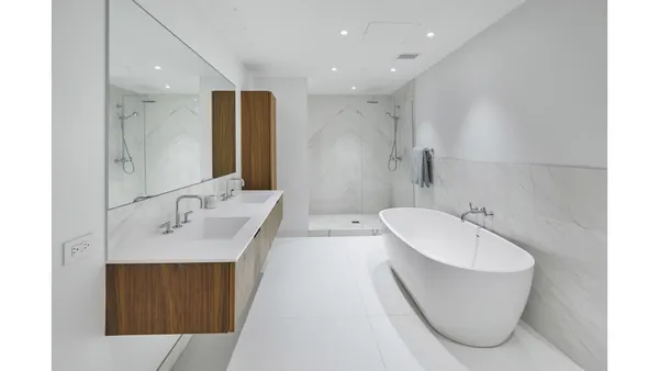 a bed room with a bed and a painting