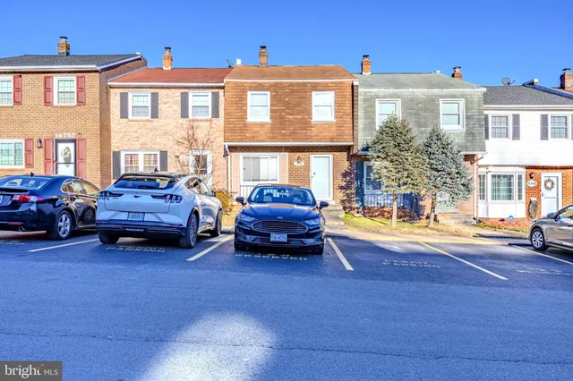a car parked in front of a house