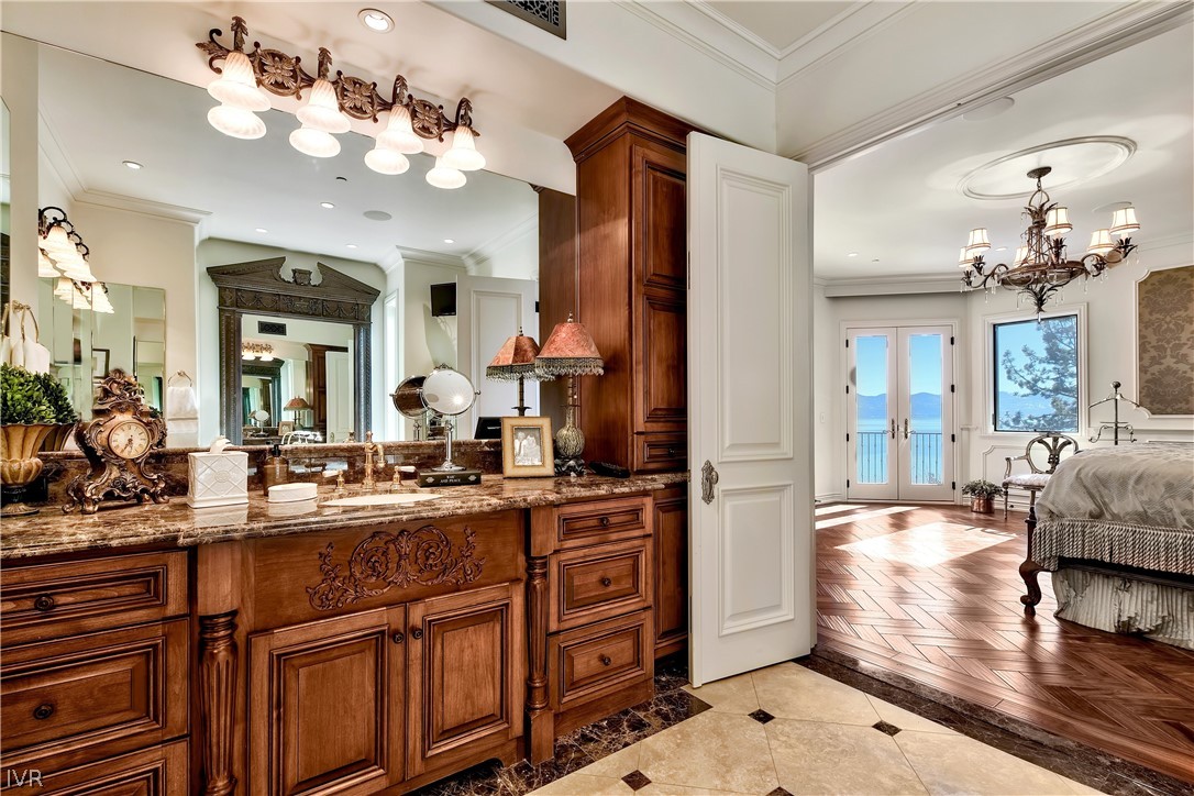 32 Crystal Drive Crystal Bay, NV 89402 - Photo 17 of 35 a view of living room with kitchen island furniture and a chandelier