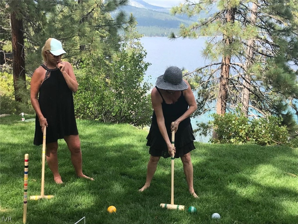 32 Crystal Drive Crystal Bay, NV 89402 - Photo 28 of 35 a backyard of a house with table and chairs