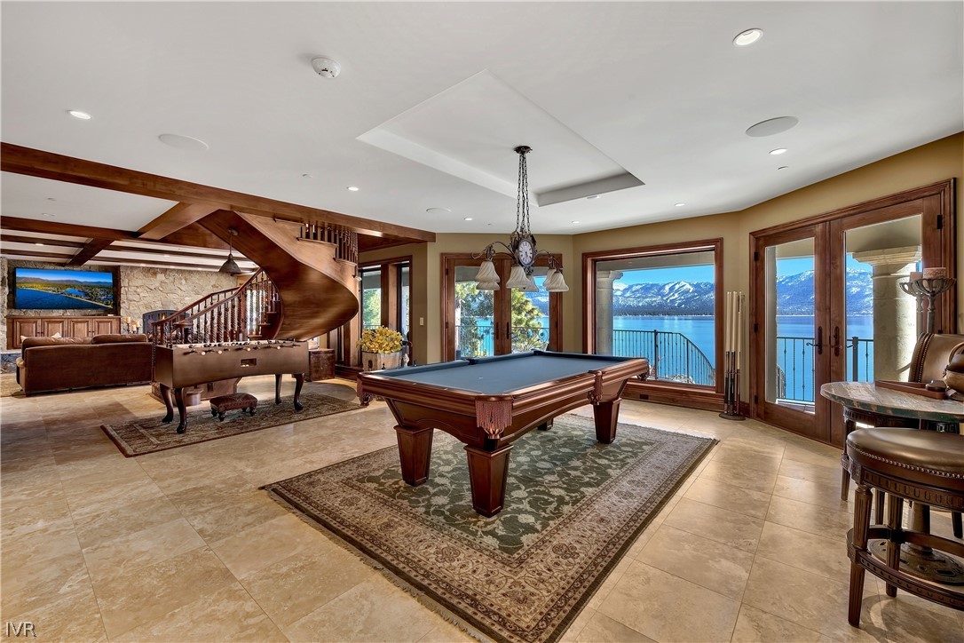 32 Crystal Drive Crystal Bay, NV 89402 - Photo 32 of 35 a living room with furniture a pool table and a large window
