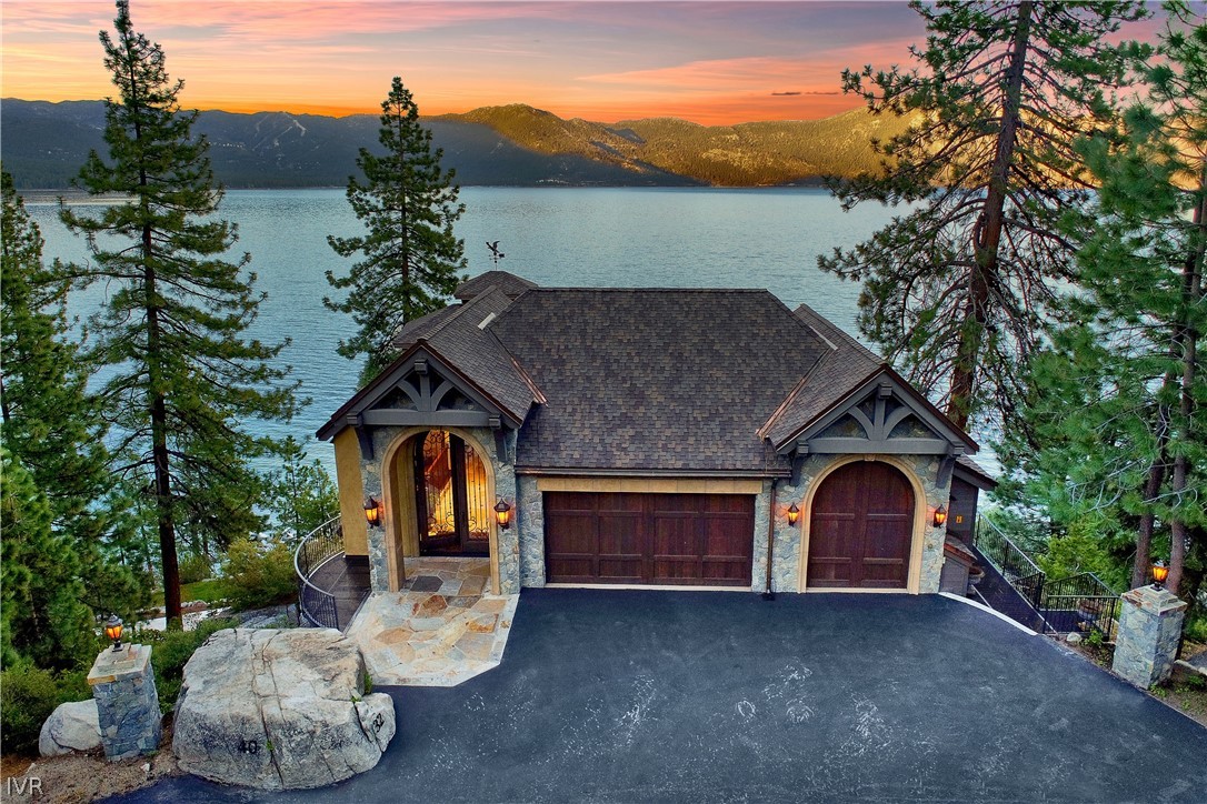 32 Crystal Drive Crystal Bay, NV 89402 - Photo 6 of 35 a front view of a house with a yard