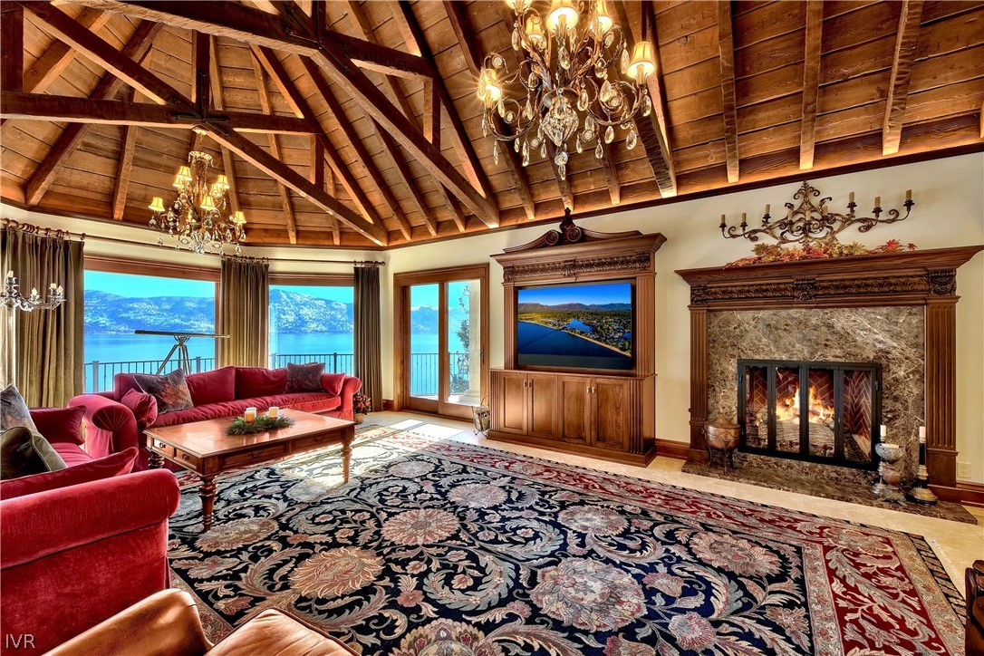 32 Crystal Drive Crystal Bay, NV 89402 - Photo 8 of 35 a bedroom with furniture and a fireplace