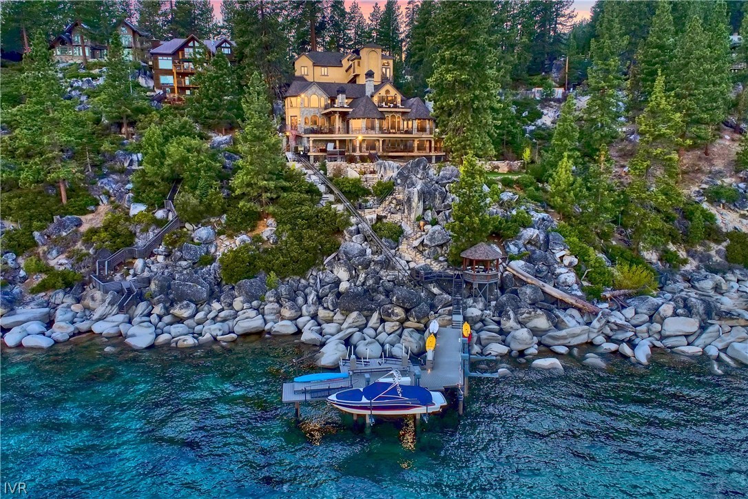 32 Crystal Drive Crystal Bay, NV 89402 - Photo 9 of 35 a swimming pool with outdoor seating and yard