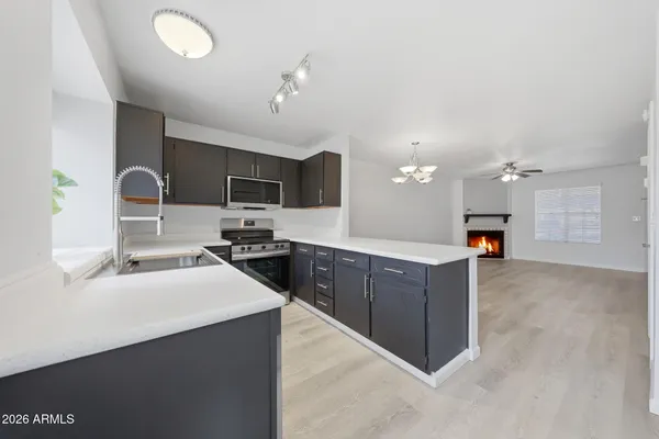 a large kitchen with cabinets