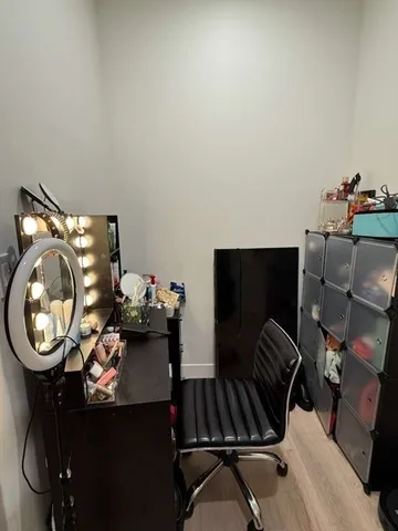 a view of a workspace with furniture