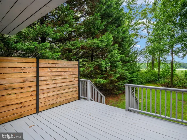 a view of a lake with a yard