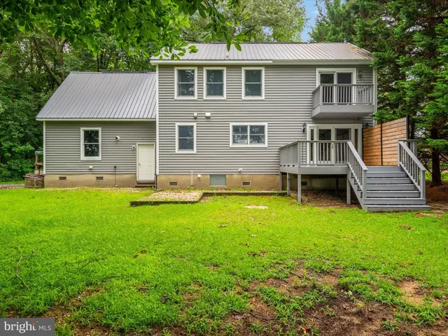 a view of a big yard with potted plants