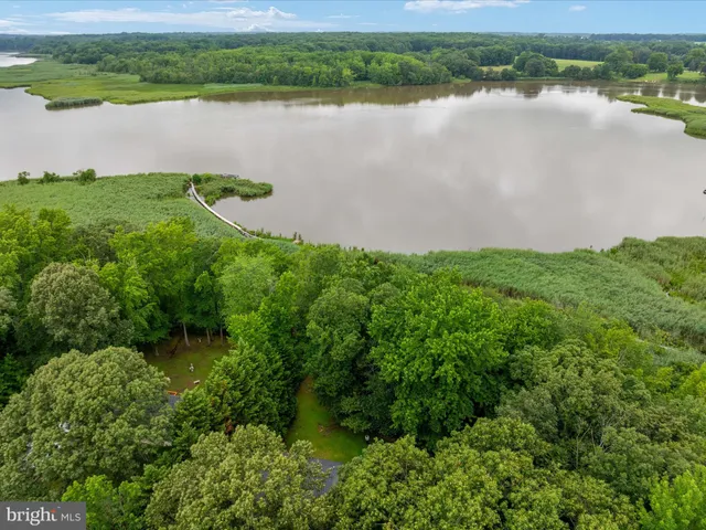 a balcony with trees in front of it