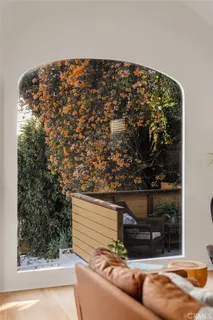 a living room with a couch and a fireplace