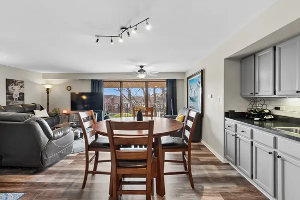 a view of a dining room with furniture window and outside view