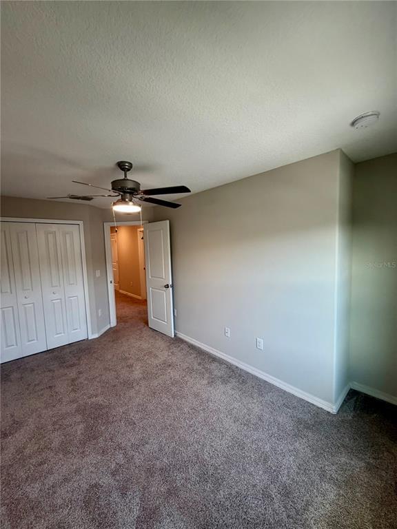 11826 Dumaine Valley Road Riverview, FL 33579 - Photo 17 of 54 an empty room with closet