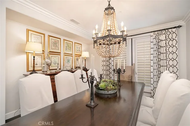 a living room with fireplace furniture and a flat screen tv