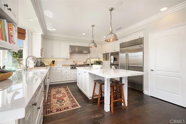 a view of a living room and dining room