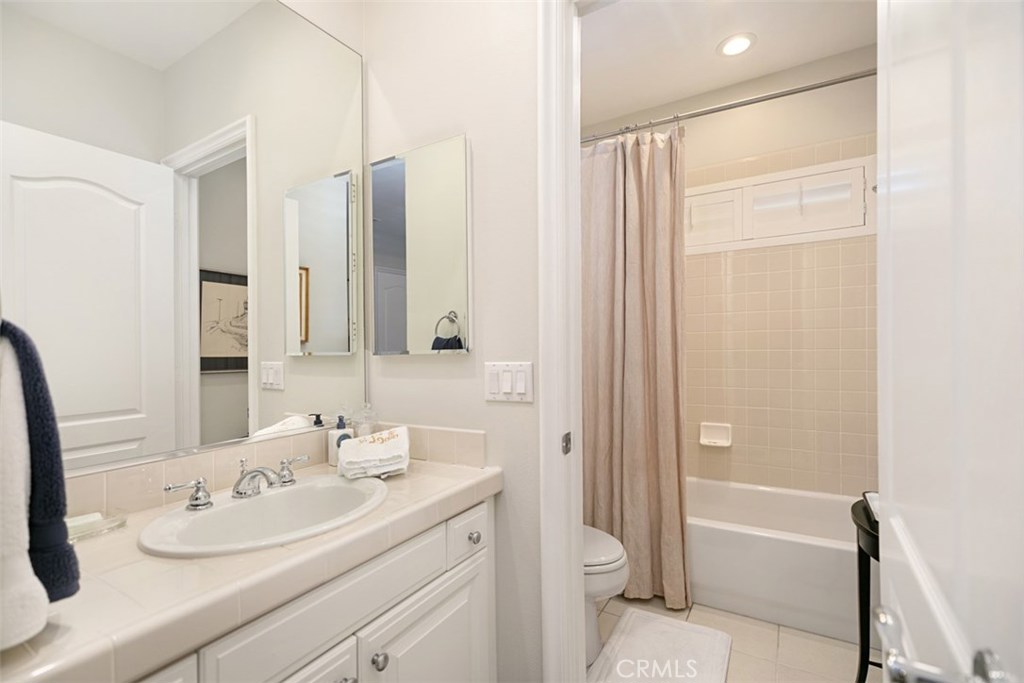 27 Via Monarca Street Dana Point, CA 92629 - Photo 39 of 62 a bathroom with a sink a toilet and shower
