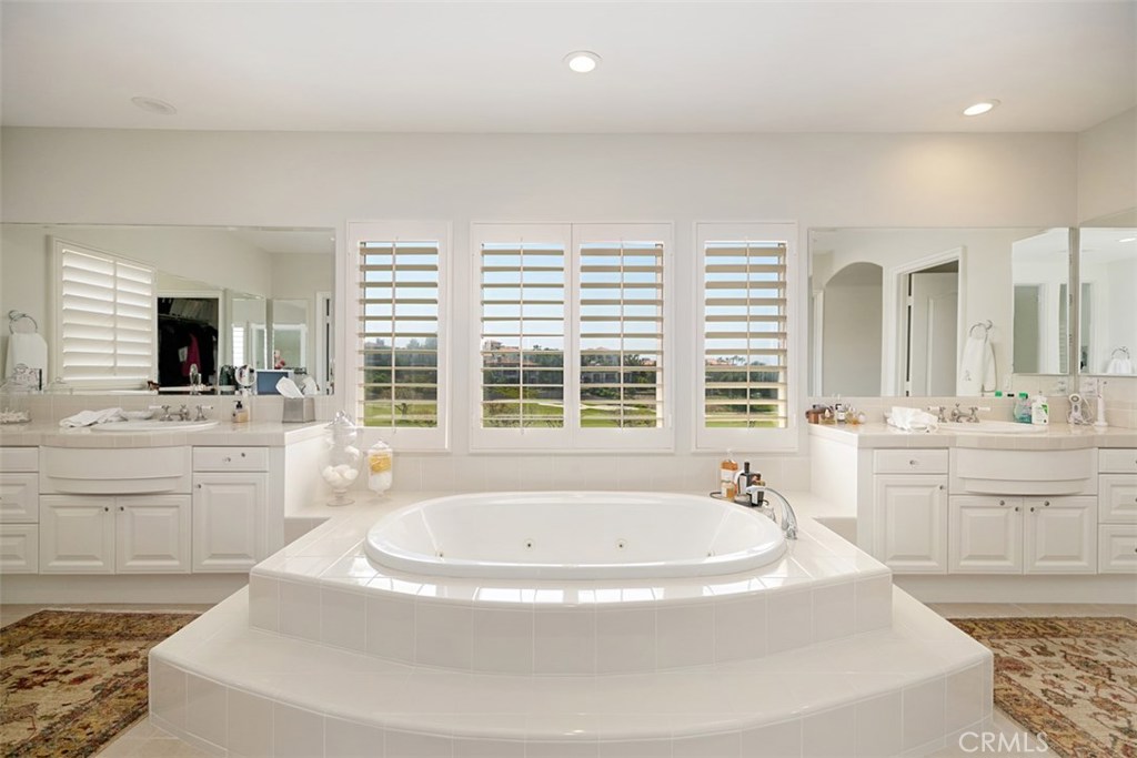 27 Via Monarca Street Dana Point, CA 92629 - Photo 51 of 62 a bathroom with a tub sink and mirror