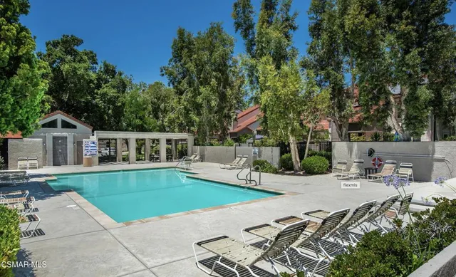 a view of a house with swimming pool