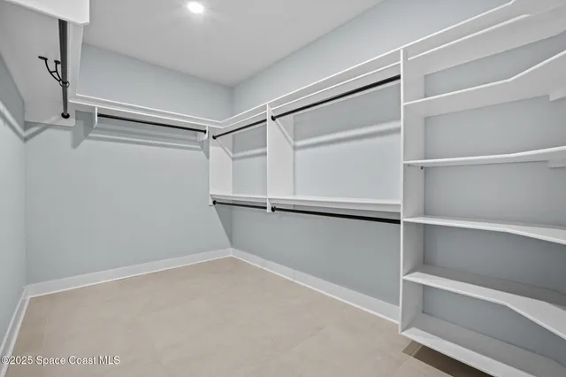 a view of a chairs and table on the wooden deck