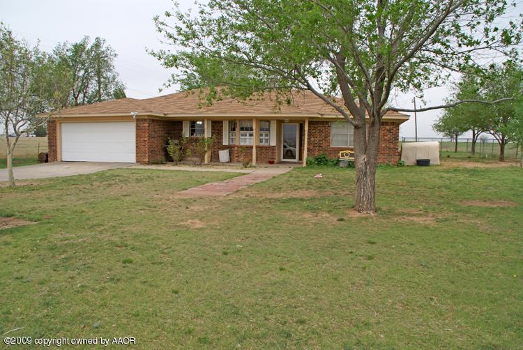 201 East Plantation Road Amarillo, TX 79118 - Photo 1 of 12 a front view of a house with a yard