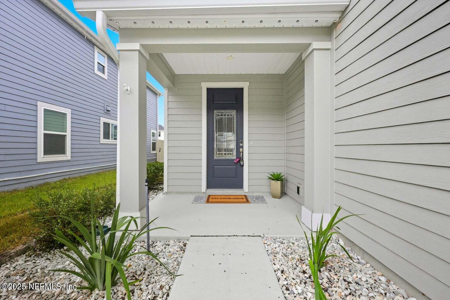 251 Rambling Brk Trail St. Johns, FL 32259 - Photo 3 of 40 a view of a house with patio
