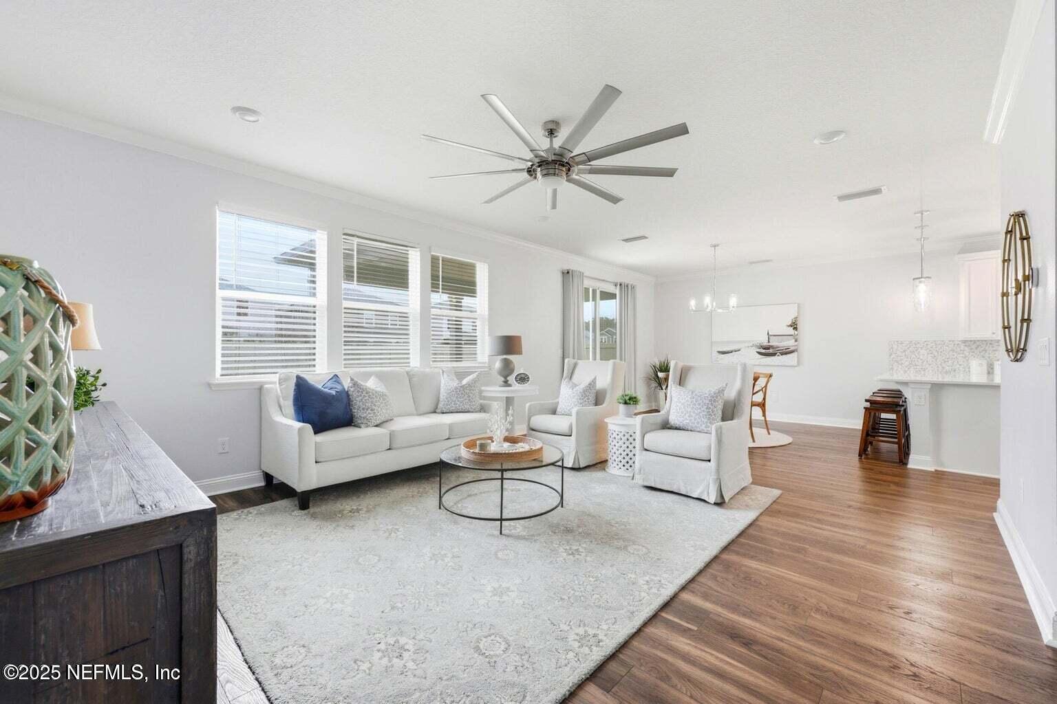 251 Rambling Brk Trail St. Johns, FL 32259 - Photo 7 of 40 a living room with furniture and a large window