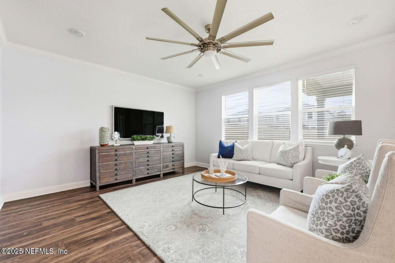 251 Rambling Brk Trail St. Johns, FL 32259 - Photo 9 of 40 a living room with furniture and a flat screen tv