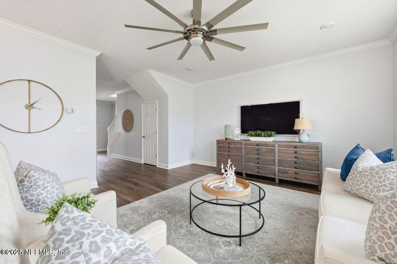251 Rambling Brk Trail St. Johns, FL 32259 - Photo 10 of 40 a living room with furniture and a flat screen tv