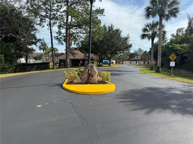 a view of a sign in front of a house