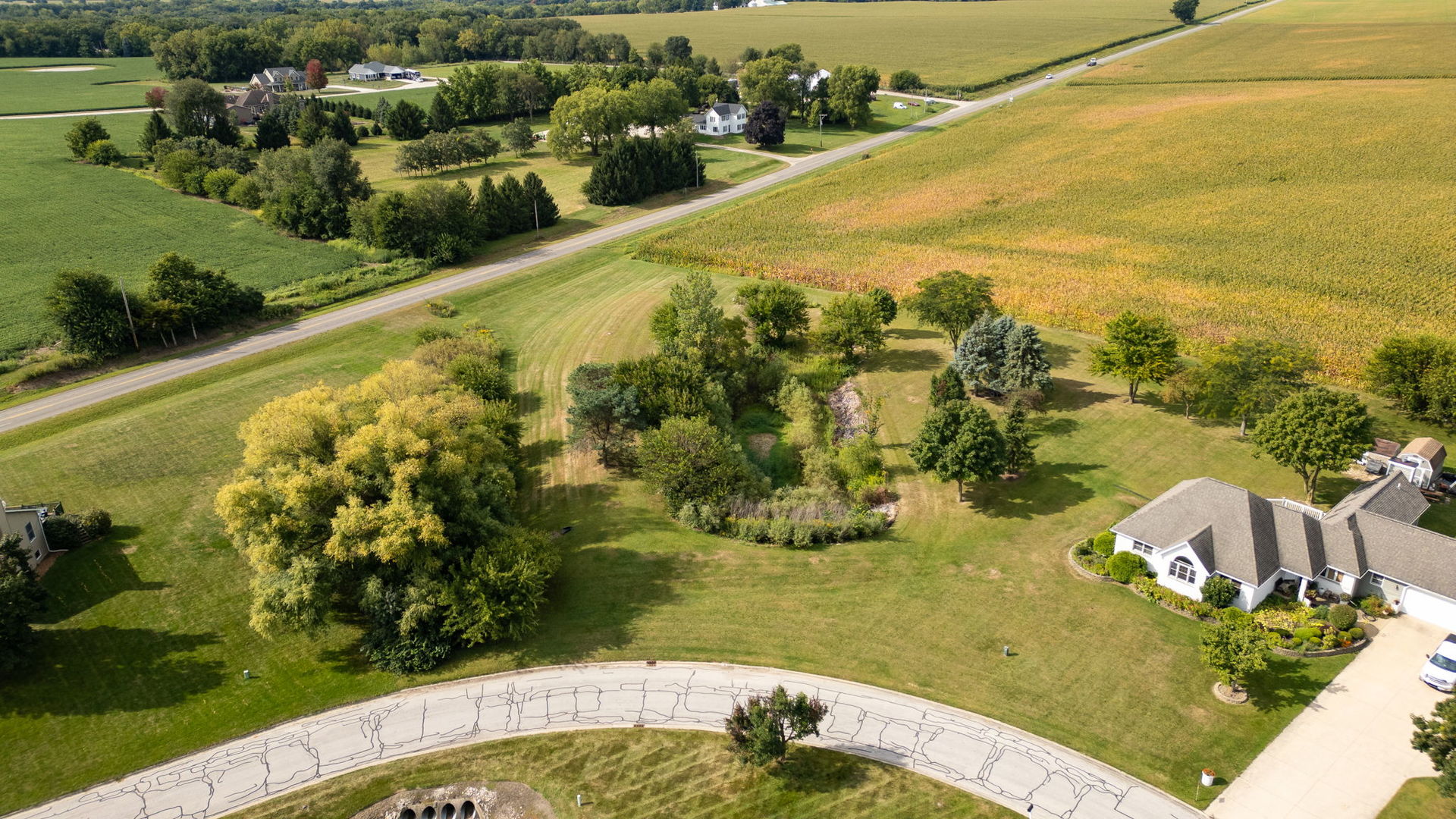 2853 North 4360th Road Sheridan, IL 60551 - Photo 2 of 9 a view of a swimming pool with a yard