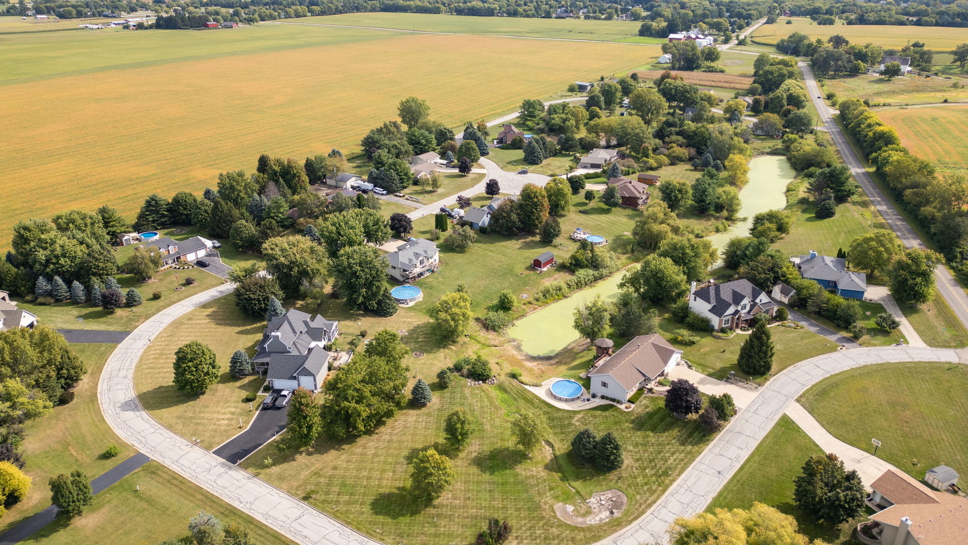 2853 North 4360th Road Sheridan, IL 60551 - Photo 4 of 9 a view of a swimming pool with outdoor seating and lake