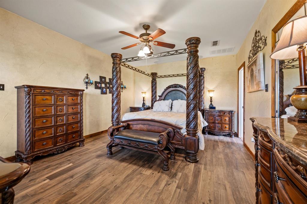 2141 Old Denton Road Decatur, TX 76234 - Photo 18 of 40 Primary bedroom with ensuite bathroom located on main floor