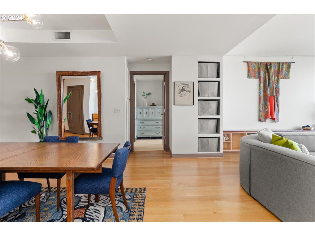 2454 Northwest Westover Road, Unit 5205 Portland, OR 97210 - Photo 16 of 33 a living room with furniture and a table