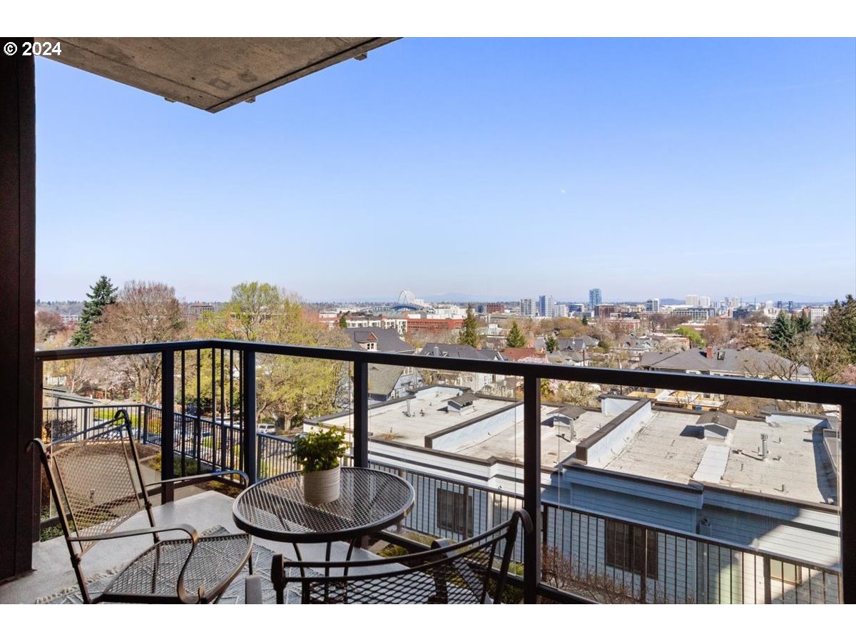 2454 Northwest Westover Road, Unit 5205 Portland, OR 97210 - Photo 26 of 33 a view of a balcony with furniture