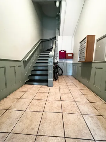 a view of entryway with stairs