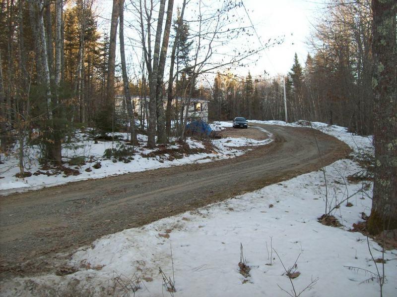 125 Linscott Road Jefferson, ME 04348 - Photo 3 of 14 Home set well off the road.