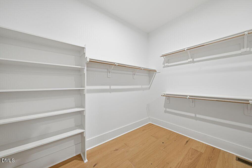 8729 Allison Road Cedar Grove, NC 27231 - Photo 22 of 63 a view of an empty walk in closet