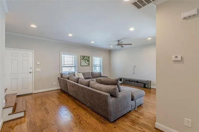 a view of entryway with wooden floor