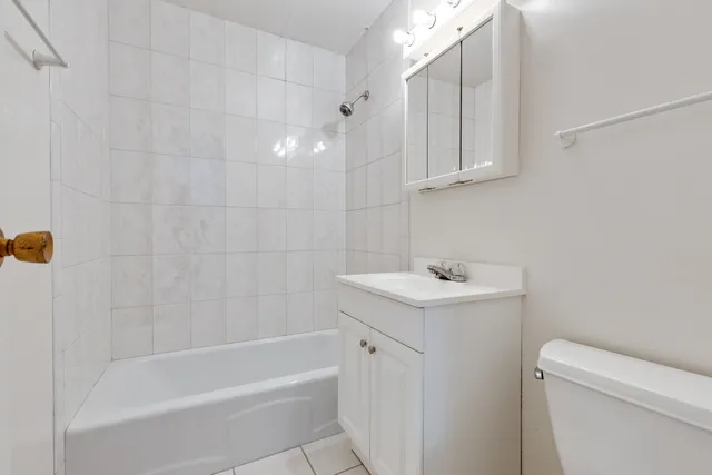 a view of a living room and entryway