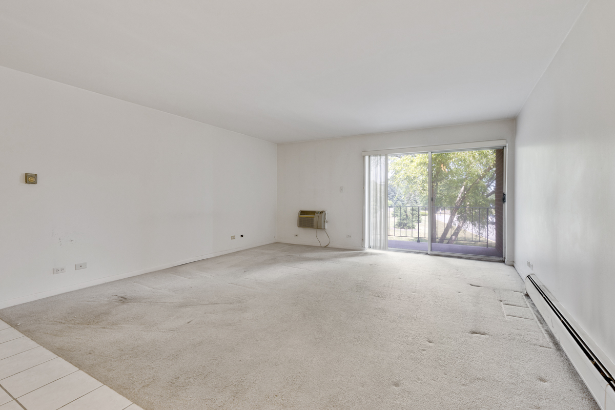16 East Old Willow Road, Unit 202S Prospect Heights, IL 60070 - Photo 8 of 25 a view of an empty room with a window