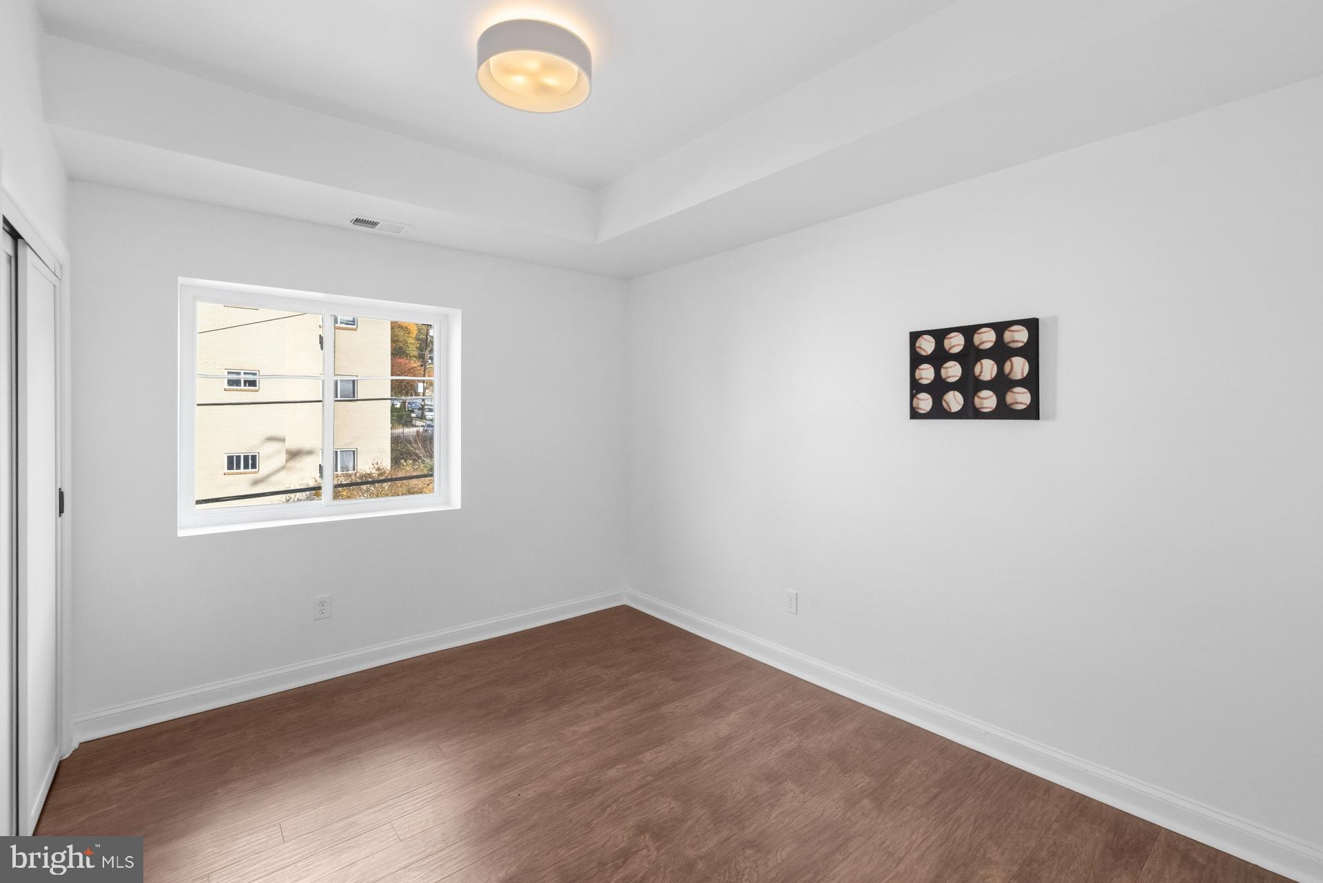 2834 R Street Southeast, Unit 6 Washington, DC 20020 - Photo 14 of 33 an empty room with a window