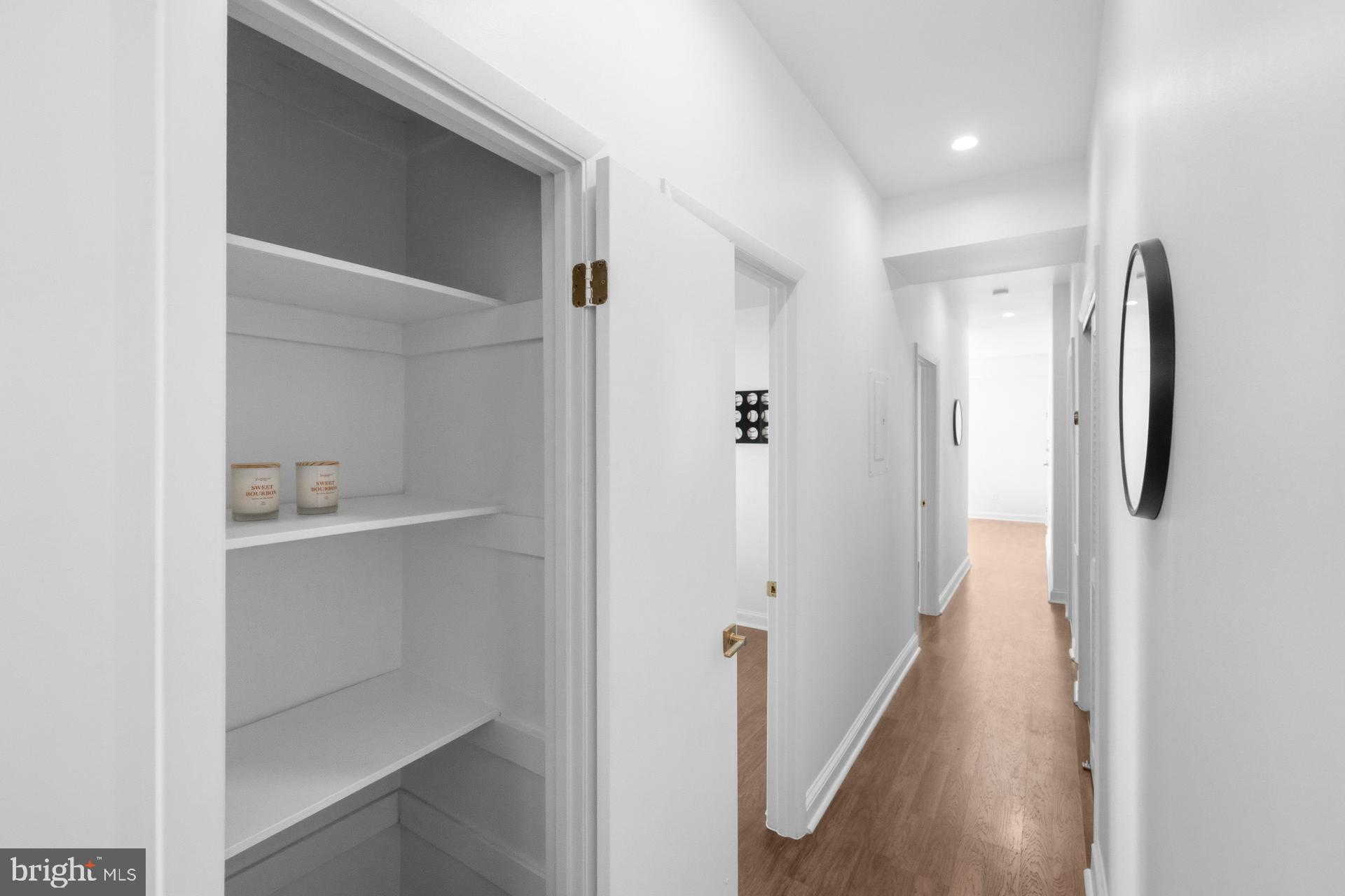 2834 R Street Southeast, Unit 6 Washington, DC 20020 - Photo 29 of 33 a view of a hallway with wooden shelves