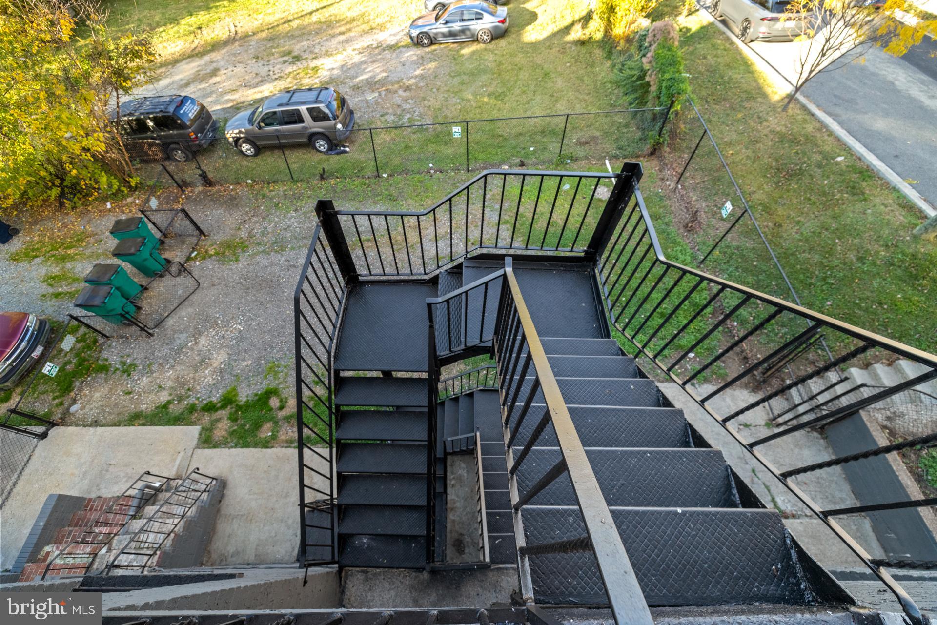 2834 R Street Southeast, Unit 6 Washington, DC 20020 - Photo 32 of 33 a view of deck with chairs and wooden fence