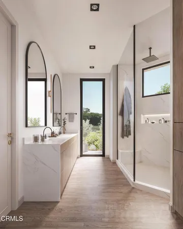 a large white kitchen with a large window