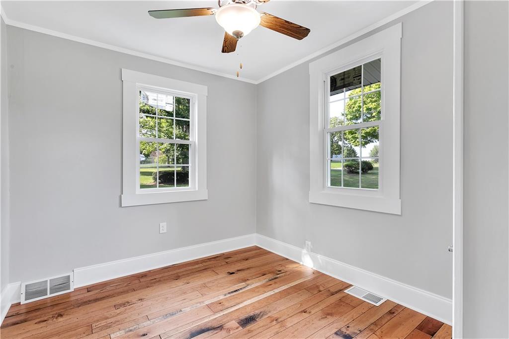 465 Edgewood Road Beaver Falls, PA 15010 - Photo 12 of 25 Each of the three bedrooms feature the gorgeous cherry flooring beautifully offset by crisp, white trim...
